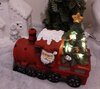 Kerstman in locomotief met LED licht