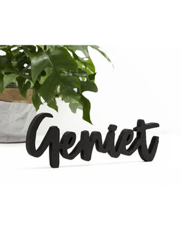 GENIET van zwart hout Mooi woonaccessoire deze aan elkaar geschreven letters met het woord GENIET.