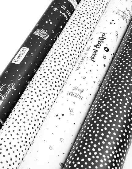 Cadeaupapier zwart met witte stippen op rol ZOEDT